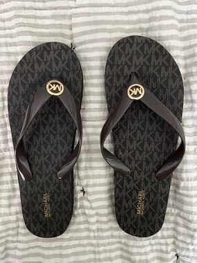 Michael Kors Dark Brown MK Logo Jelly Flip Flops with Gold Emblem